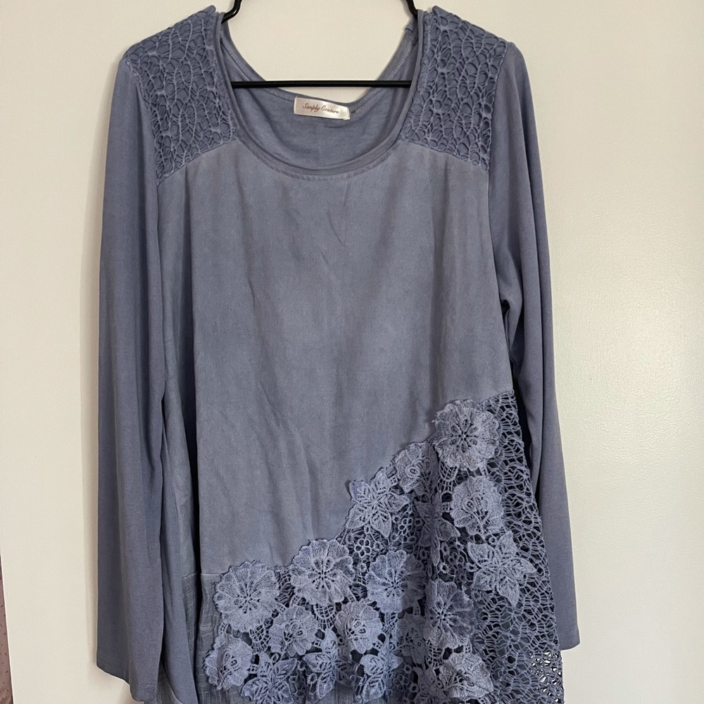 Woman’s long sleeved dress, above the knee length. Size Large Crocheted pieces.
